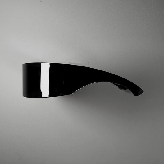 Visor Sunglasses, Shme-Shno, Hungarian brand, Budapest-founded, futuristic sunglasses, avant-garde design, techwear accessory, mirrored shield lens, streetwear influence, statement eyewear, full-face mirrored lens, UV protection, bold silhouette, pairing with headwear, futuristic street style, high fashion accessory, art-inspired sunglasses, Eastern European fashion, limited edition, wearable art.