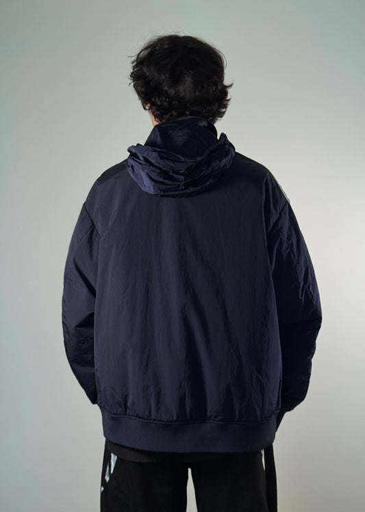 "Men's black track jacket with white stripe sleeves, front zip closure, and embroidered 'SHME-SHNO' and 'Bence Varga' branding – stylish streetwear outerwear for casual fashion."